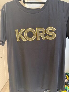 Brand new Michael Kors Black Graphic Logo Tee with gold sparkle Accent